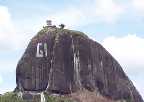 Piedra de Penol with graffiti on side