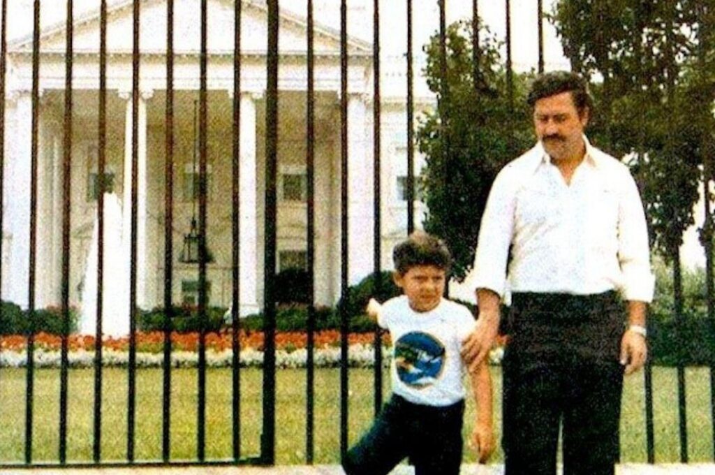 Pablo Escobar and his son standing in front of White House