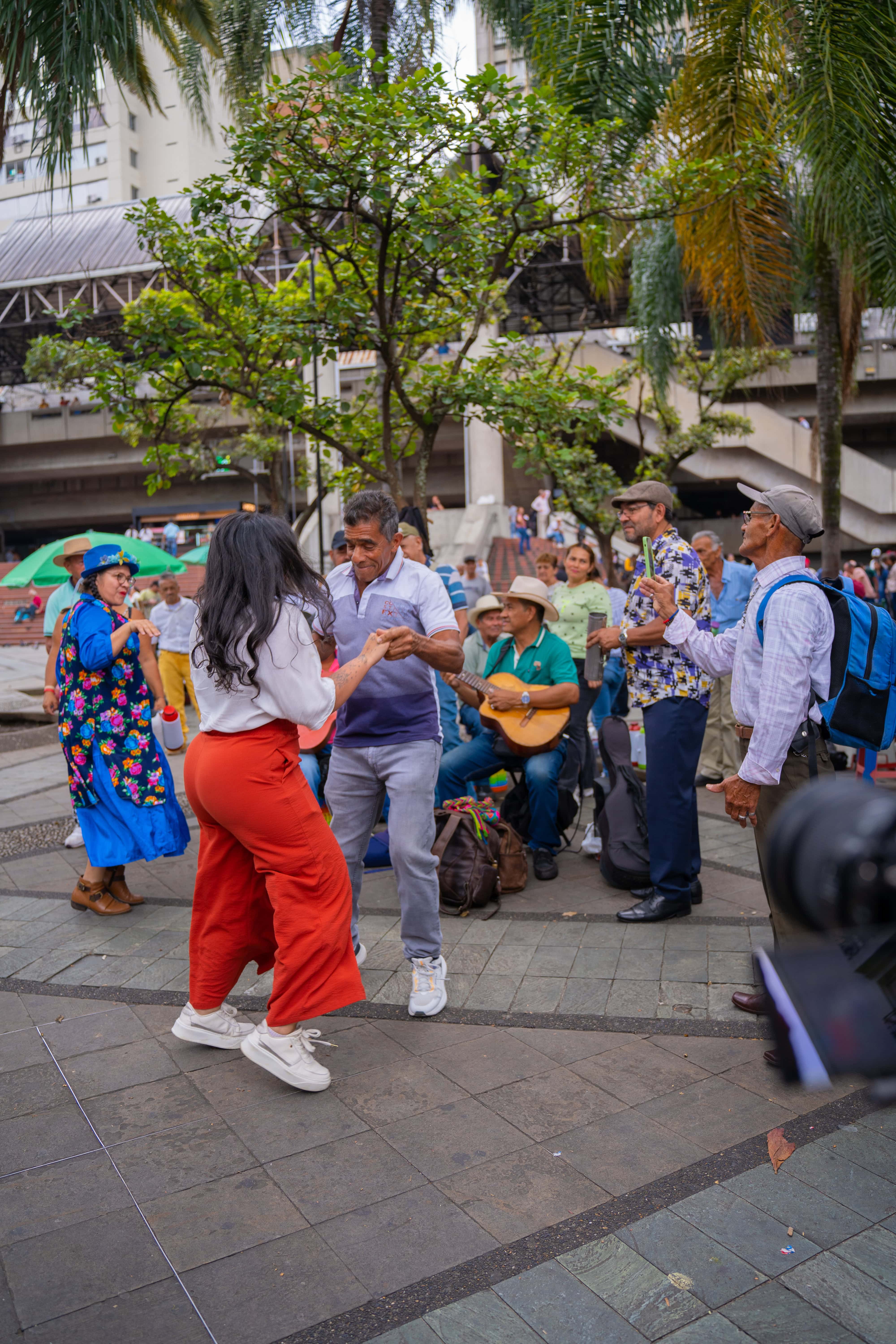 Salsa dancing with locals in Parque Berrío, Medellín
