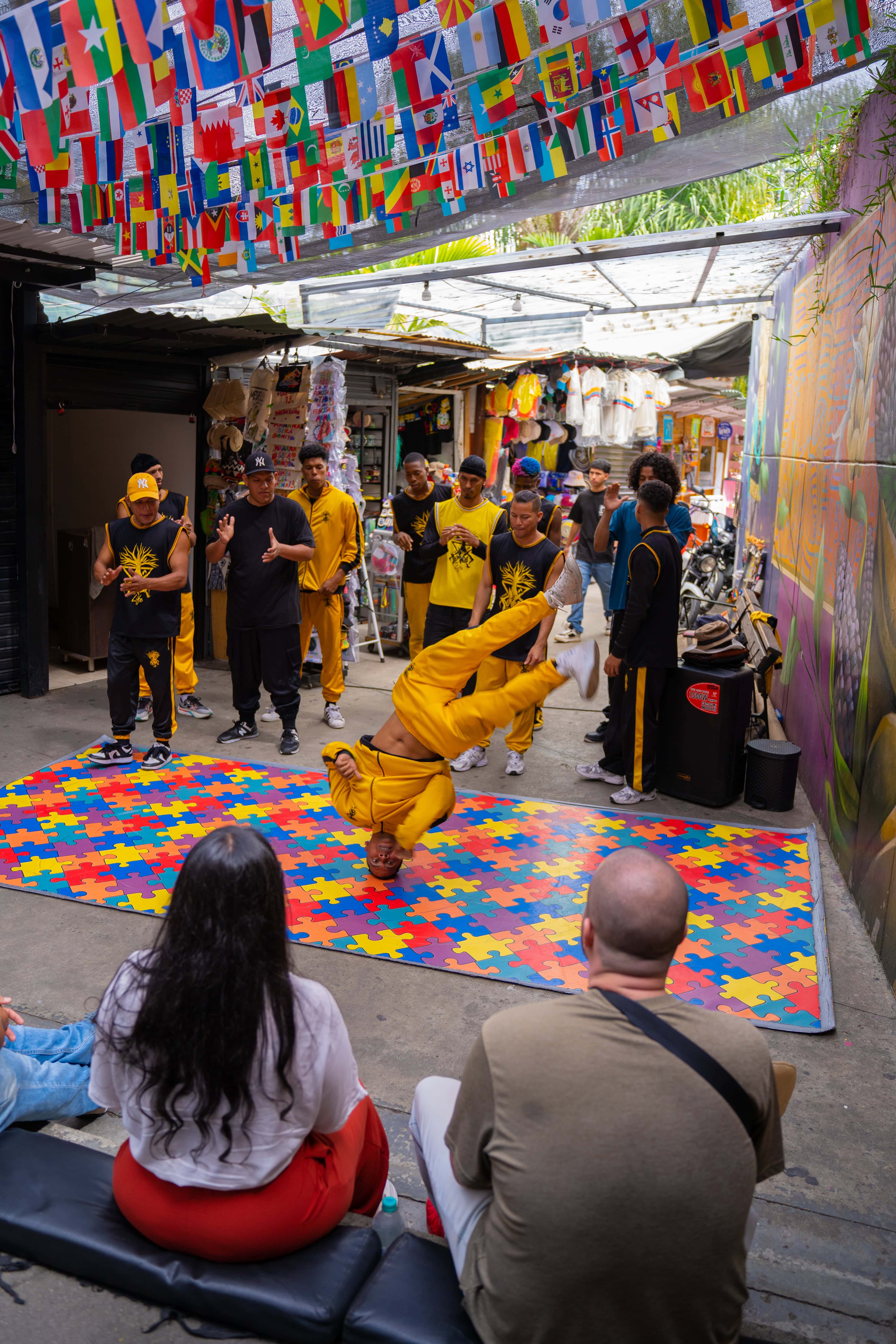 Breakdancer performing for tourists in Comuna 13